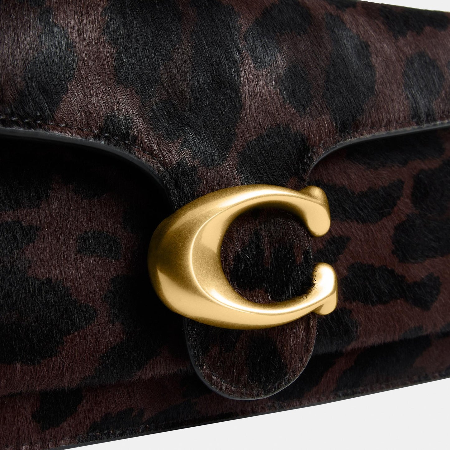 حقيبة كتف "تابي 26" من شعر العجل بنقشة فهد