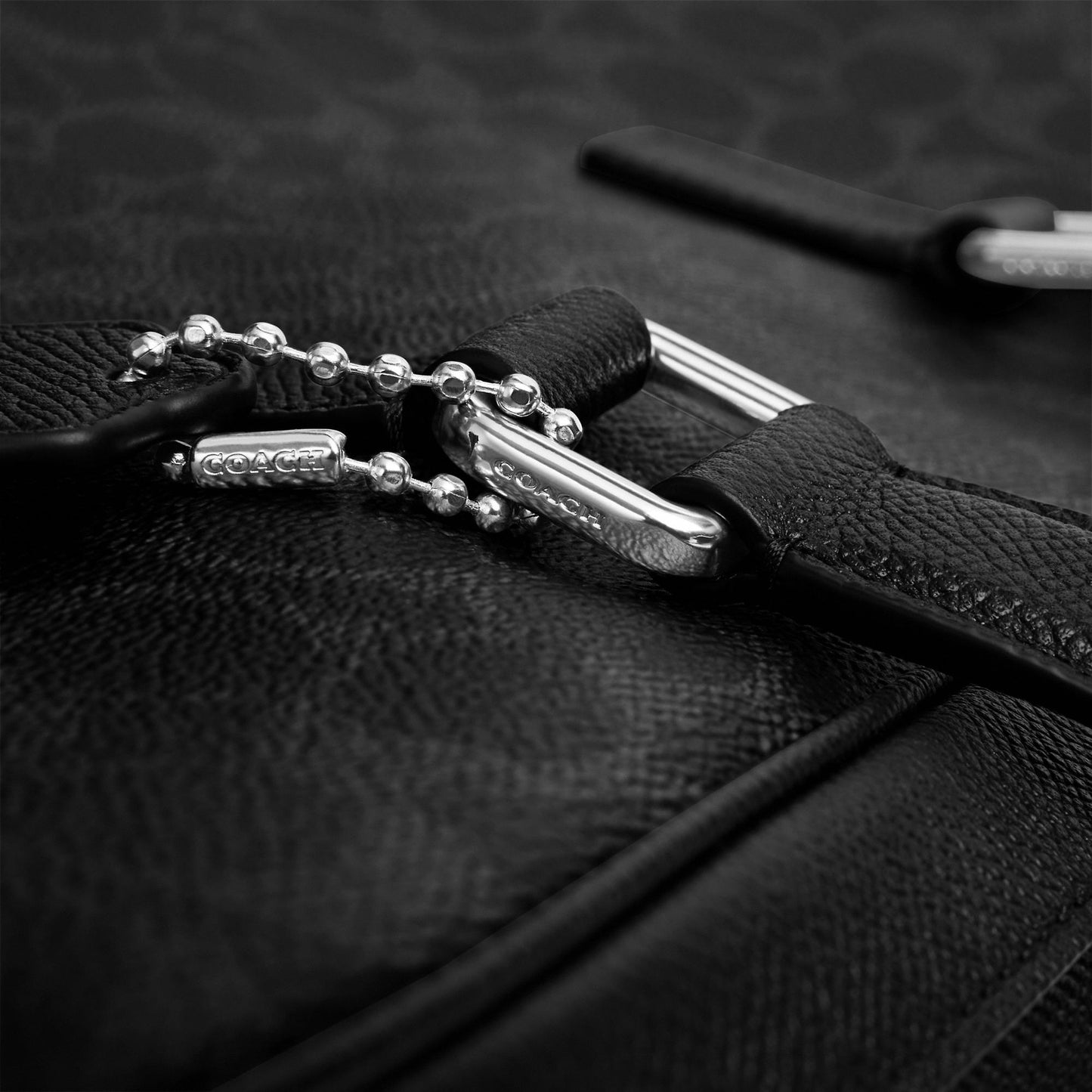 حقيبة بريف"كايدن" بنقشة كوتش