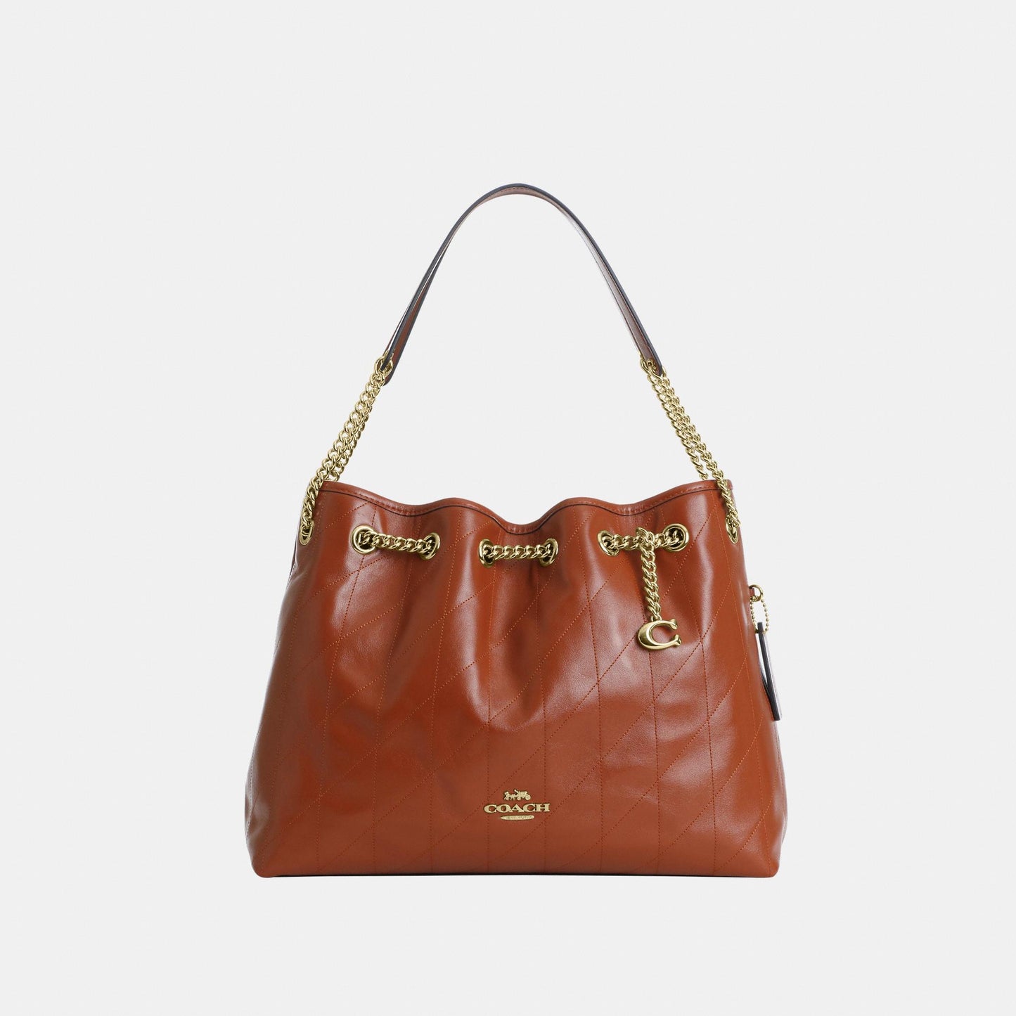 CES33-Evelyn Shoulder Bag with Quilting and Charm-Im/Cinnamon