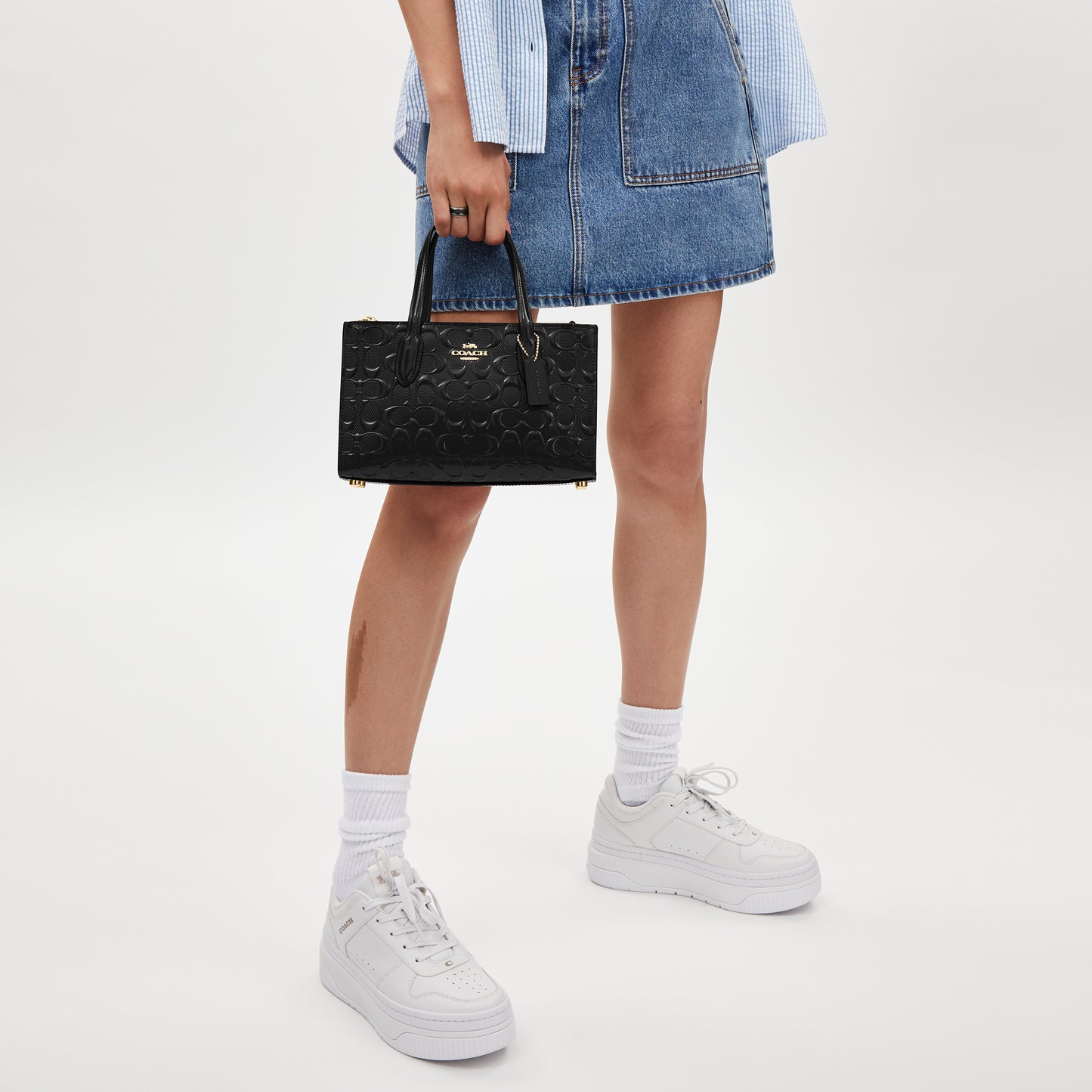 حقيبة يد "نينا NINA" بحجم صغير من الجلد بنقشة كوتش