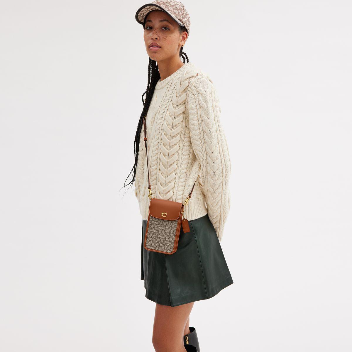 CM510-Phone Crossbody In Micro Signature Jacquard-B4/Cocoa Burnished Amb