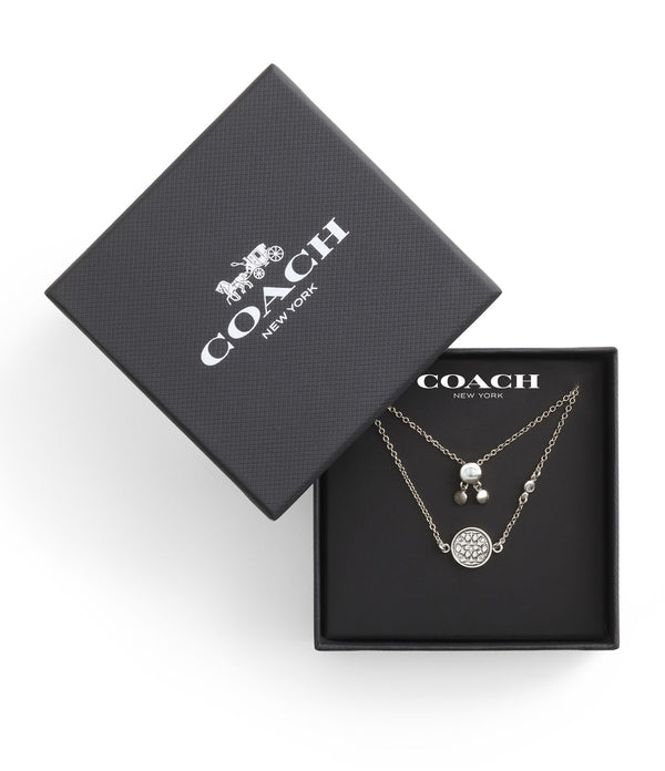 سوار بحلية بتصميم عملة معدنية مزينة بشعار كوتش