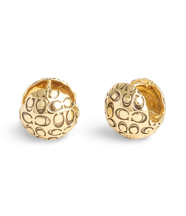 أقراط بتصميم كرة مبطنة مزينة بشعار كوتش