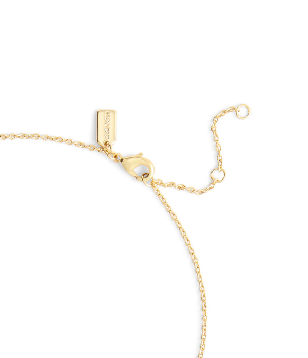 قلادة بتصميم قلب مزين بشعار كوتش C مرصع بكريستال بافيه