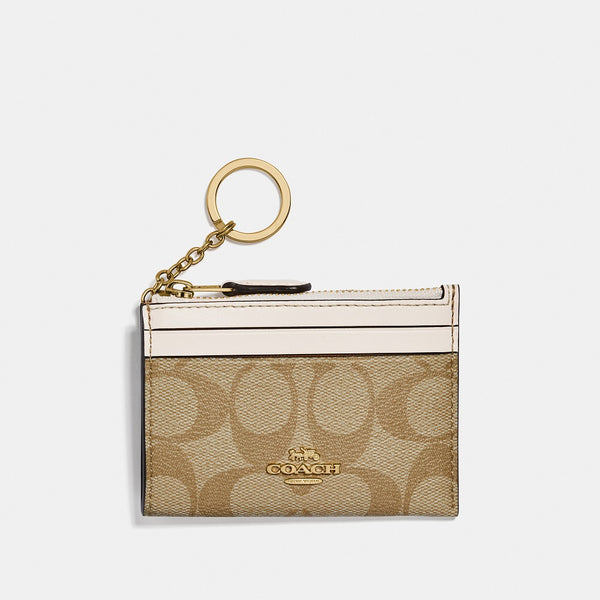 Mini Skinny Id Case In Signature Canvas