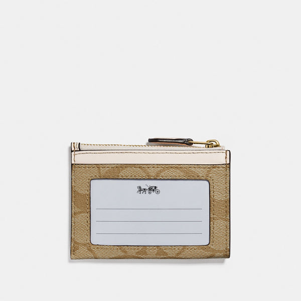 Mini Skinny Id Case In Signature Canvas
