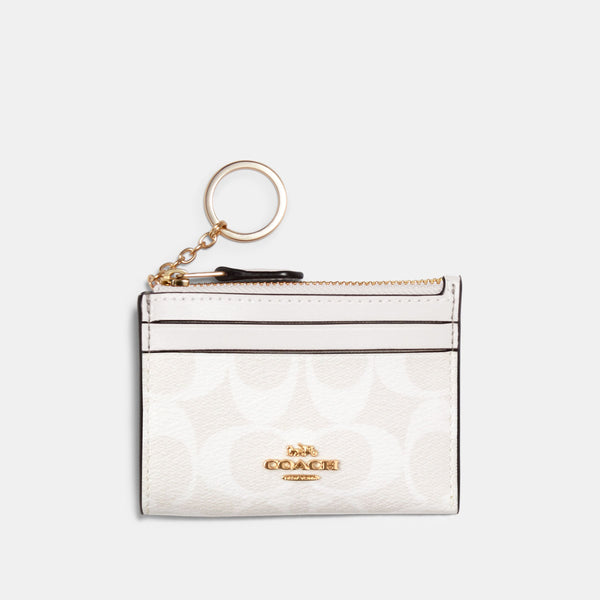Mini Skinny Id Case In Signature Canvas