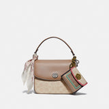 89089-Cassie Crossbody 19 In Signature Canvas-LH/Sand Taupe