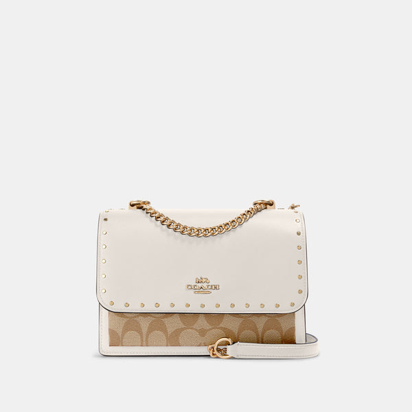 Klare Crossbody In Signature Canvas With Rivets