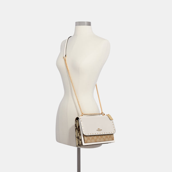 Klare Crossbody In Signature Canvas With Rivets