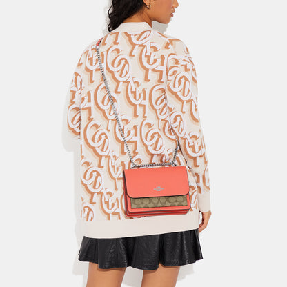 91019-Klare Crossbody In Signature Canvas-Sv/Khaki/Tangerine