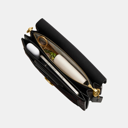 حقيبة كتف "تابي 26" من شعر العجل بنقشة فهد