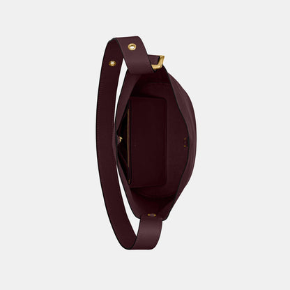 حقيبة باكيت "بليكر" من الجلد الطبيعي المحبّب