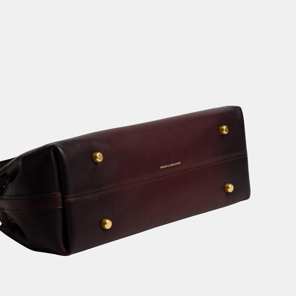 حقيبة كاريال " إمباير 34" من الجلد الطبيعي المحبّب بتأثير لامع