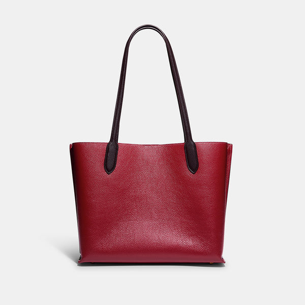 حقيبة "ويلو توت Willow Tote" بألوان مُغايرة و مبطنة بقماش يحمل نقشة ماركة كوتش