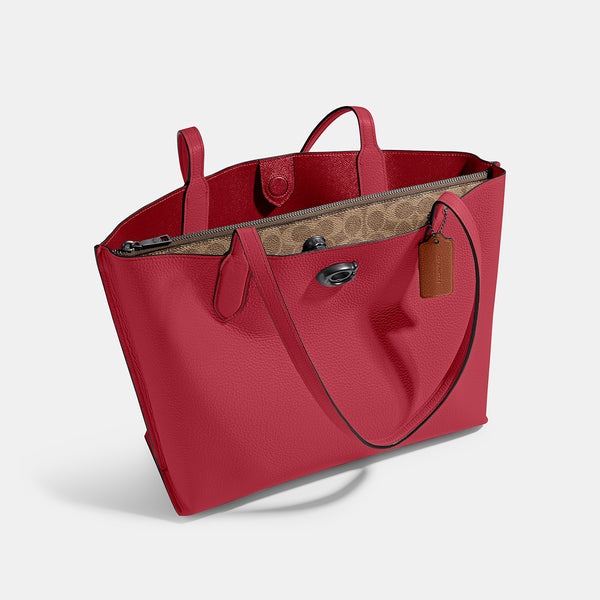 حقيبة "ويلو توت Willow Tote" بألوان مُغايرة و مبطنة بقماش يحمل نقشة ماركة كوتش