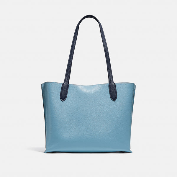 حقيبة "ويلو توت Willow Tote" بألوان مُغايرة و مبطنة بقماش يحمل نقشة ماركة كوتش