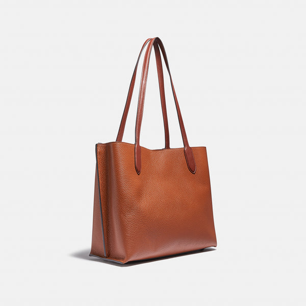 حقيبة "ويلو توت Willow Tote" بألوان مُغايرة و مبطنة بقماش يحمل نقشة ماركة كوتش