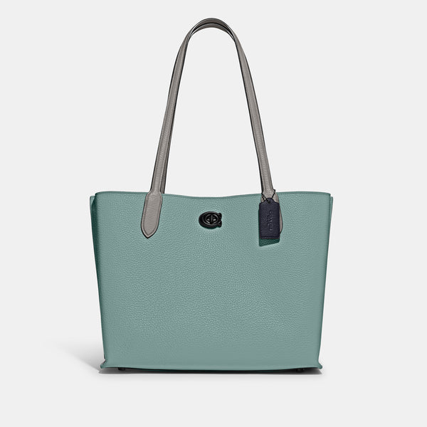 حقيبة "ويلو توت Willow Tote" بألوان مُغايرة و مبطنة بقماش يحمل نقشة ماركة كوتش