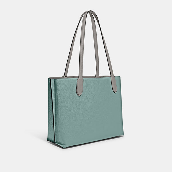حقيبة "ويلو توت Willow Tote" بألوان مُغايرة و مبطنة بقماش يحمل نقشة ماركة كوتش