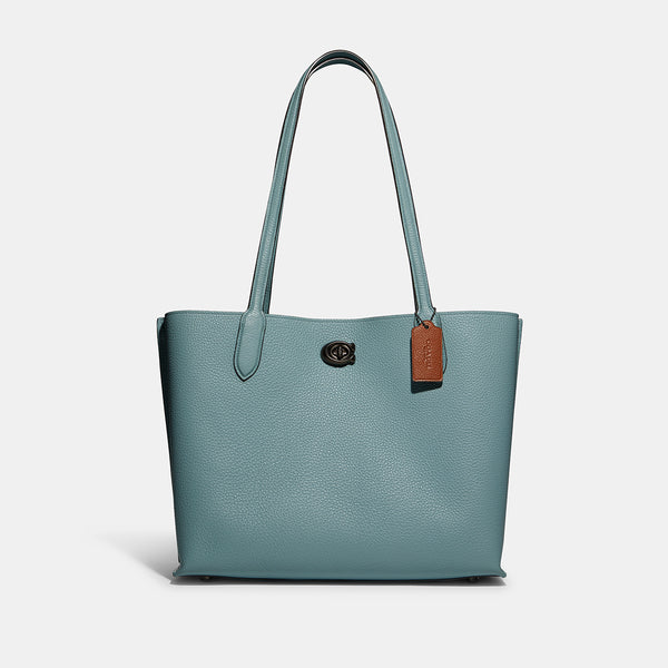 حقيبة "ويلو توت Willow Tote" بألوان مُغايرة و مبطنة بقماش يحمل نقشة ماركة كوتش