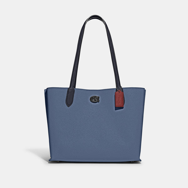 حقيبة "ويلو توت Willow Tote" بألوان مُغايرة و مبطنة بقماش يحمل نقشة ماركة كوتش