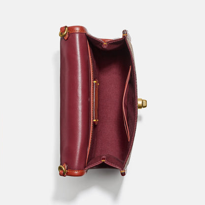 Kip Turnlock Crossbody In Signature Canvas - COACH Saudi Arabia Official Site