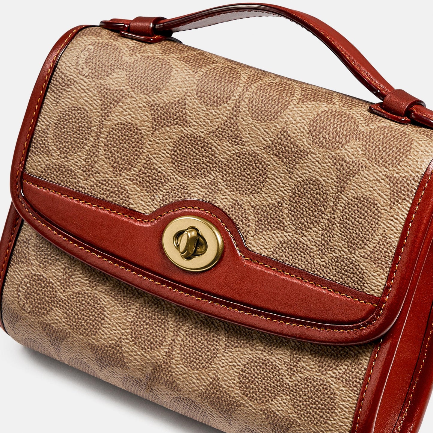 Kip Turnlock Crossbody In Signature Canvas - COACH Saudi Arabia Official Site