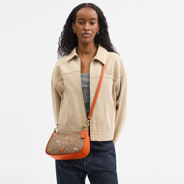 Teri Shoulder Bag In Signature Canvas With Orange Print