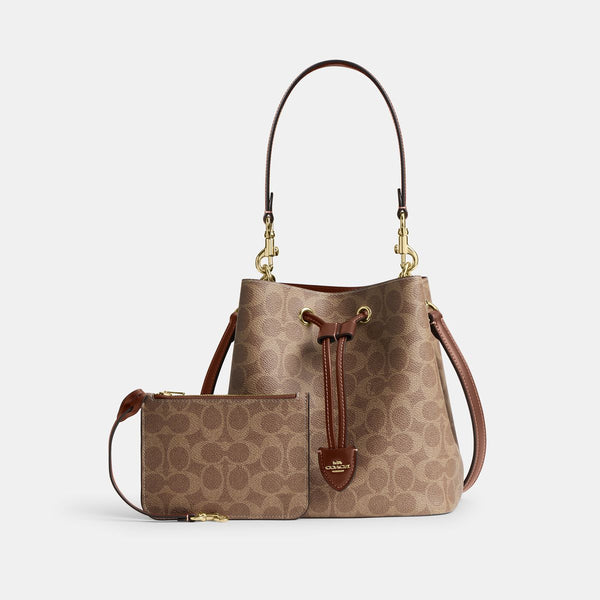 Rowan Bucket Bag In Signature Canvas