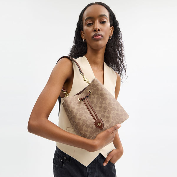 Rowan Bucket Bag In Signature Canvas