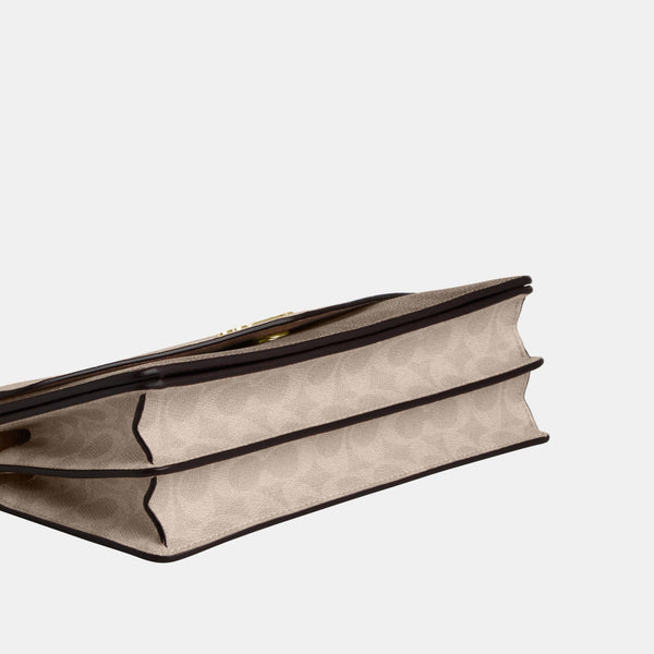 حقيبة كروس بودي "كلير" بتصميم مغلف من القماش بنقشة كوتش 