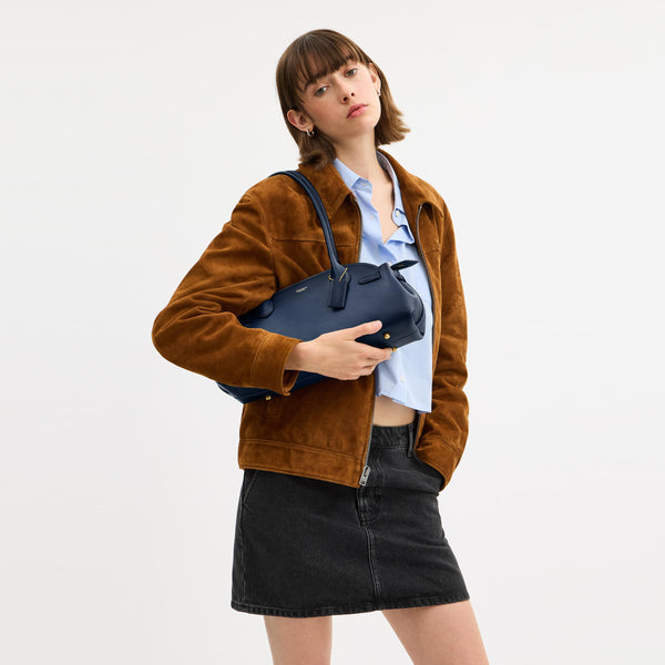 حقيبة كاريال " إمباير 34" من الجلد الطبيعي المحبّب بتأثير لامع