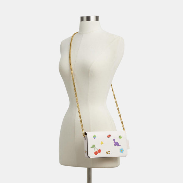 حقيبة كروس بودي "ميلا" من الجلد بطبعة ستيكر