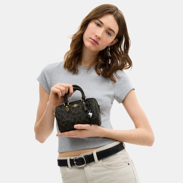 Mini Rowan Crossbody in Loved Signature Canvas with Charms