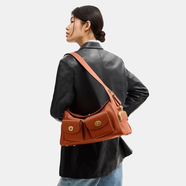 The Coach Originals Natural Grain Leather Turnlock Haversack Bag