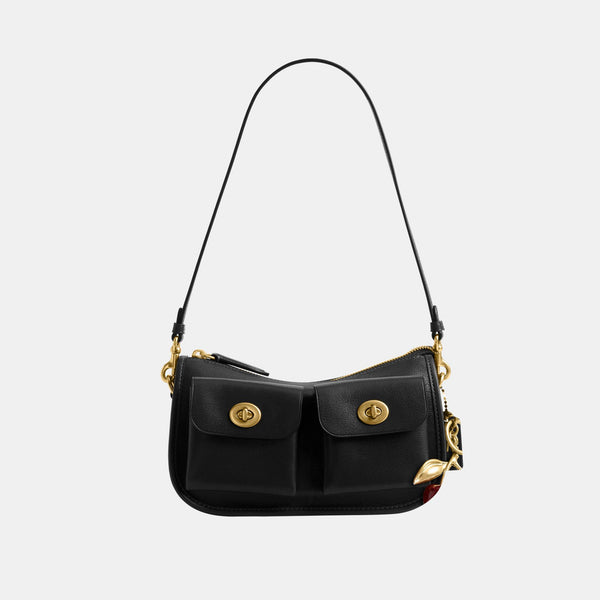 The Coach Originals Natural Grain Leather Twin Turnlock Waverly Bag