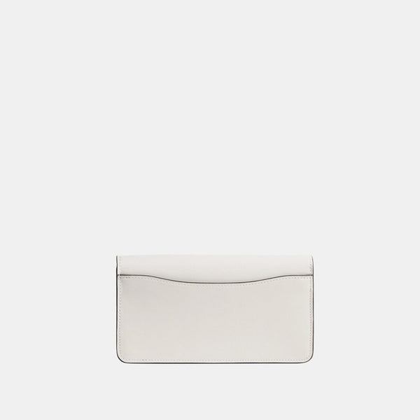 Tabby Chain Clutch In Signature Canvas