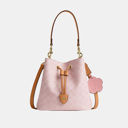 CEA23-Rowan Bucket Bag in Signature Canvas with Charms-Im/Powder Pink