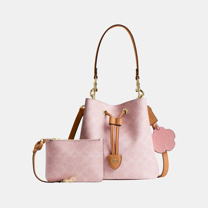 CEA23-Rowan Bucket Bag in Signature Canvas with Charms-Im/Powder Pink