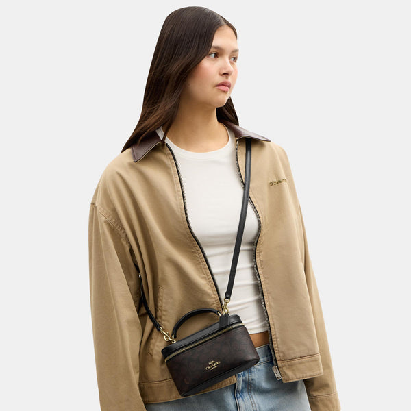 Rainer Crossbody Bag 18 in Signature Canvas