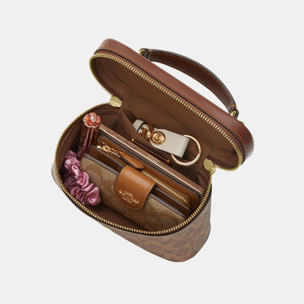 Rainer Crossbody Bag 18 in Signature Canvas