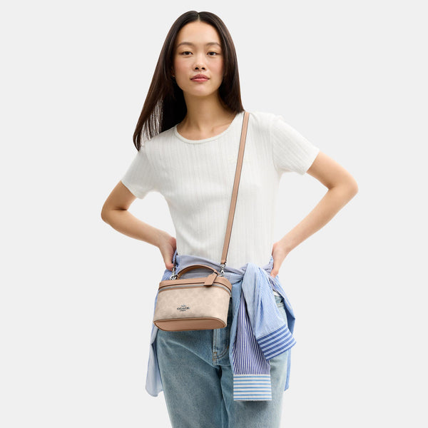 Rainer Crossbody Bag 18 in Signature Canvas