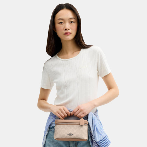Rainer Crossbody Bag 18 in Signature Canvas