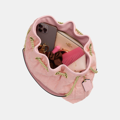 CER79-Evelyn Shoulder Bag in Loved Denim with Quilting and Charm-Im/Light Pink