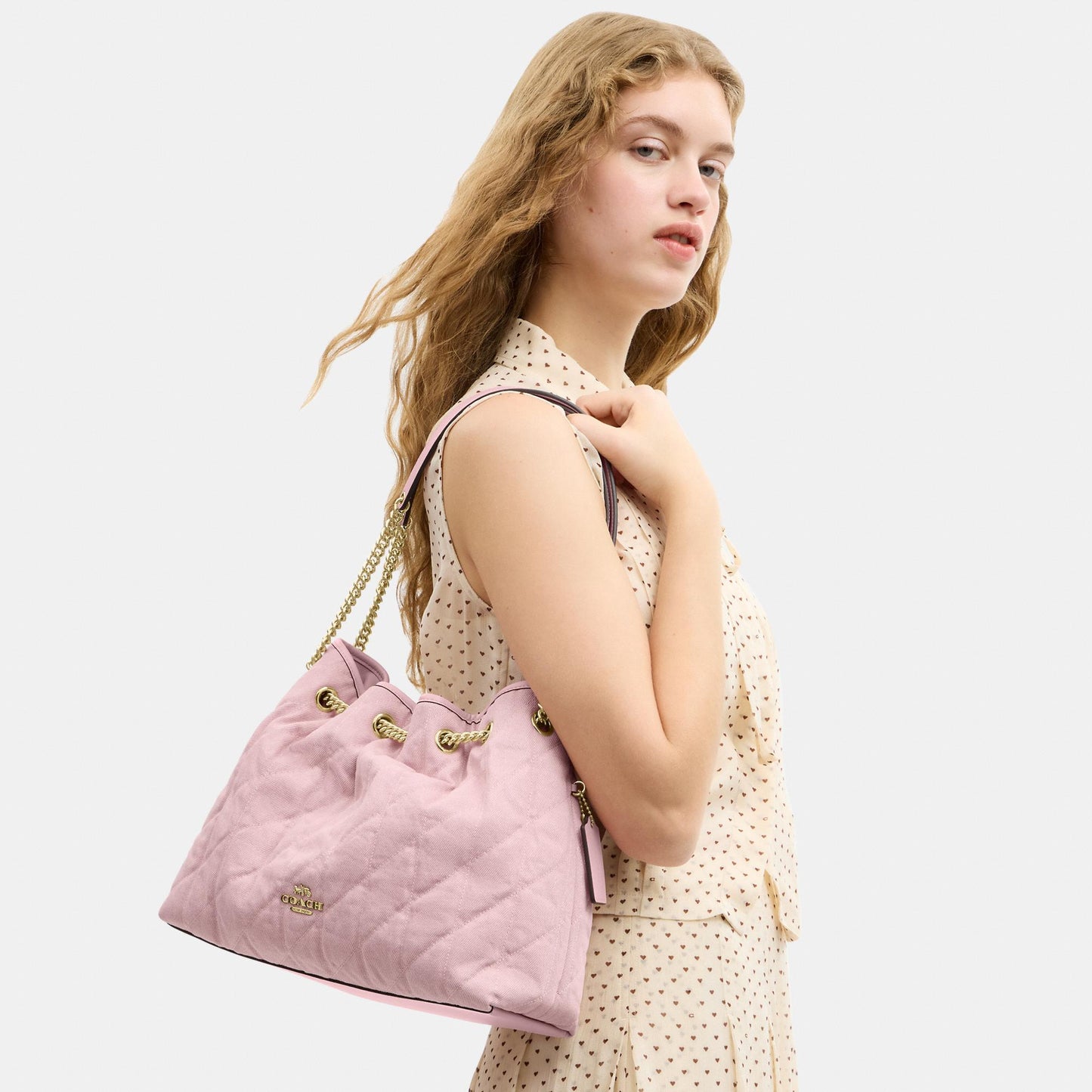 CER79-Evelyn Shoulder Bag in Loved Denim with Quilting and Charm-Im/Light Pink