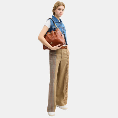 CES33-Evelyn Shoulder Bag with Quilting and Charm-Im/Cinnamon