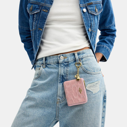 CEU98-Small Corner Zip Wallet in Signature Denim with Charms-Im/Light Pink