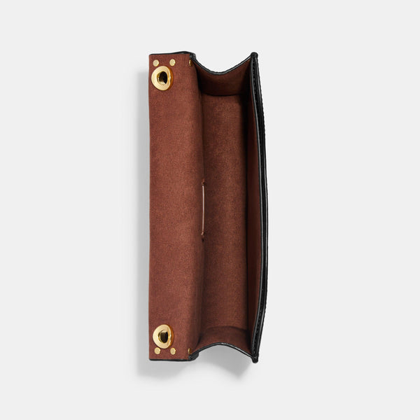 حقيبة "مورغان Morgan" الكروس بودي من القماش بنقشة ماركة كوتش المقسم بالألوان و مرصعة بالمسامير