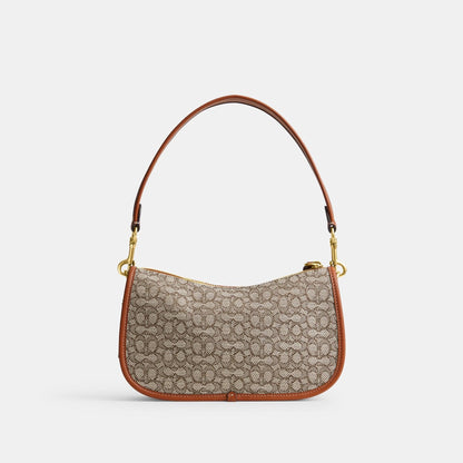 Swinger In Micro Signature Jacquard - COACH Saudi Arabia Official Site